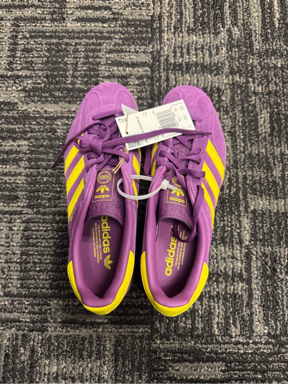 adidas Women’s Purple Sneakers with Yellow Stripes